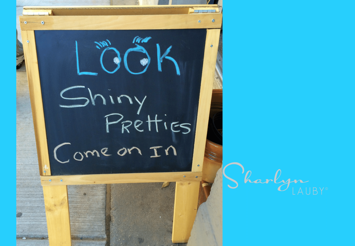 sign, sidewalk sign, distraction, shiny pretties, look, Udemy
