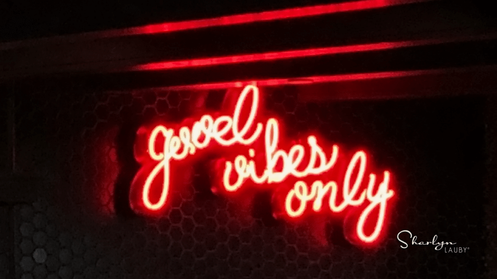 neon bar sign good vibes only for psychological safety