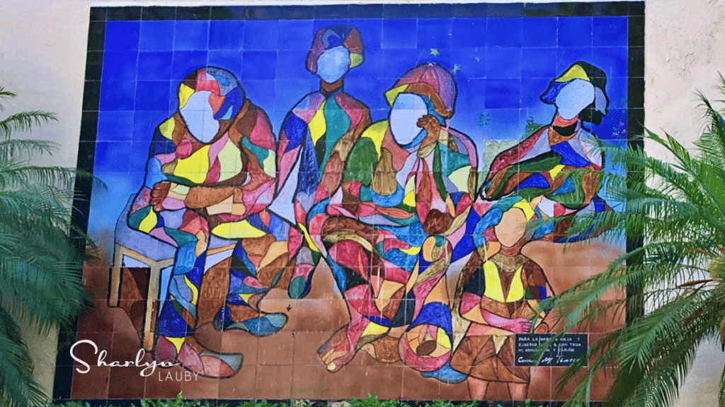 wall art seated people on the streets of Havana Cuba representing labor unions