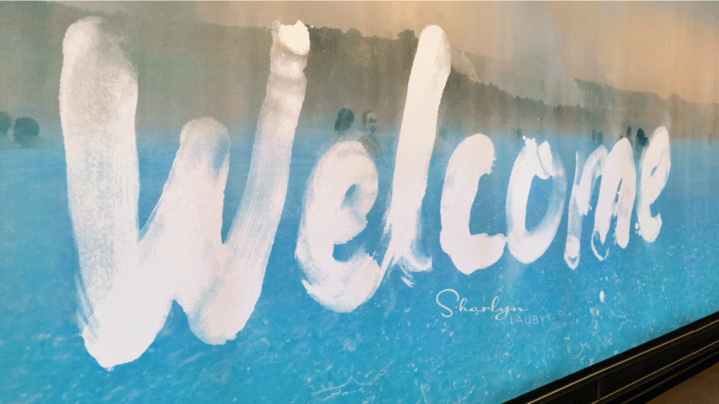 wall art airport welcome sign saying welcome back