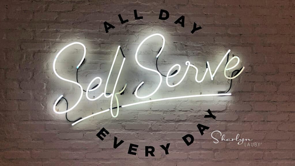 self serve white neon sign showing how to plan for self directed learning
