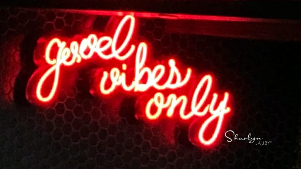 neon sign good vibes only like what to say to an annoying colleague