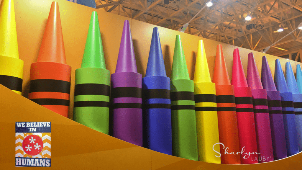 conference prop showing large crayon box for the holiday season