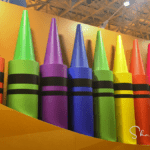 conference prop showing large crayon box for the holiday season