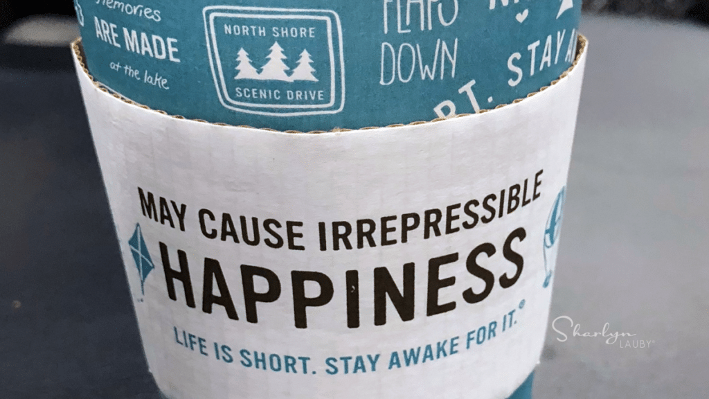 coffee cup saying wellbeing may cause irrepressible happiness