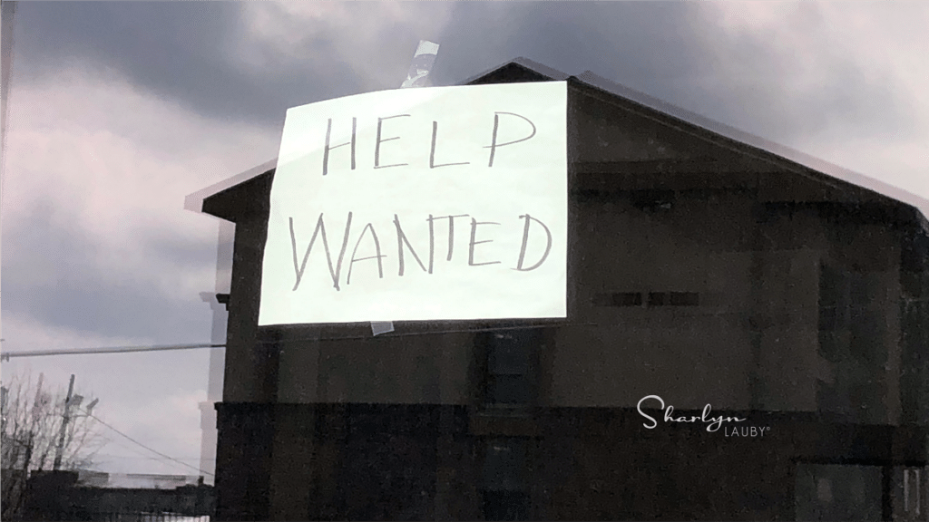 hand written help wanted sign used to recruit
