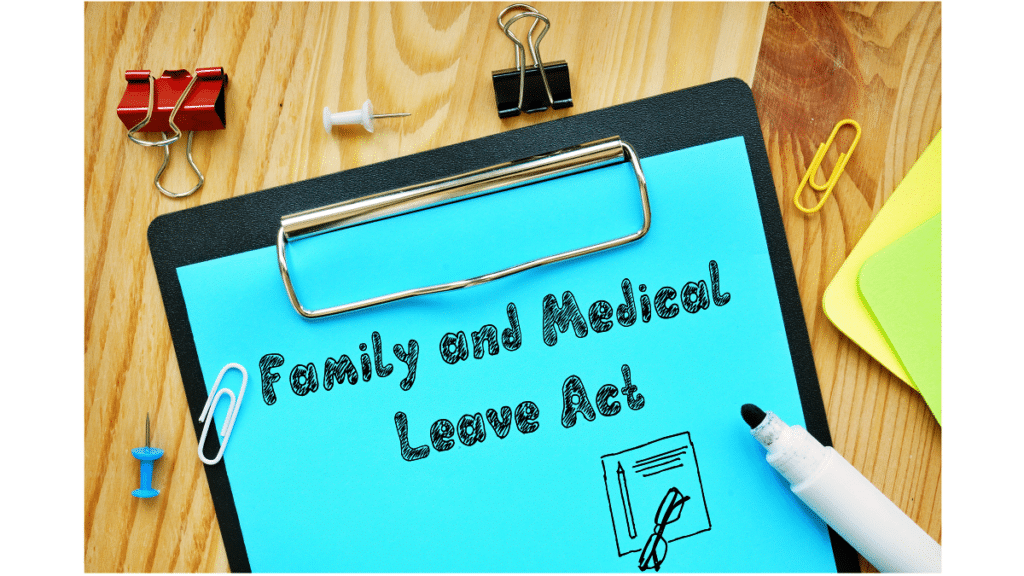 clipboard with Family and Medical Leave Act showing HR Law strategy