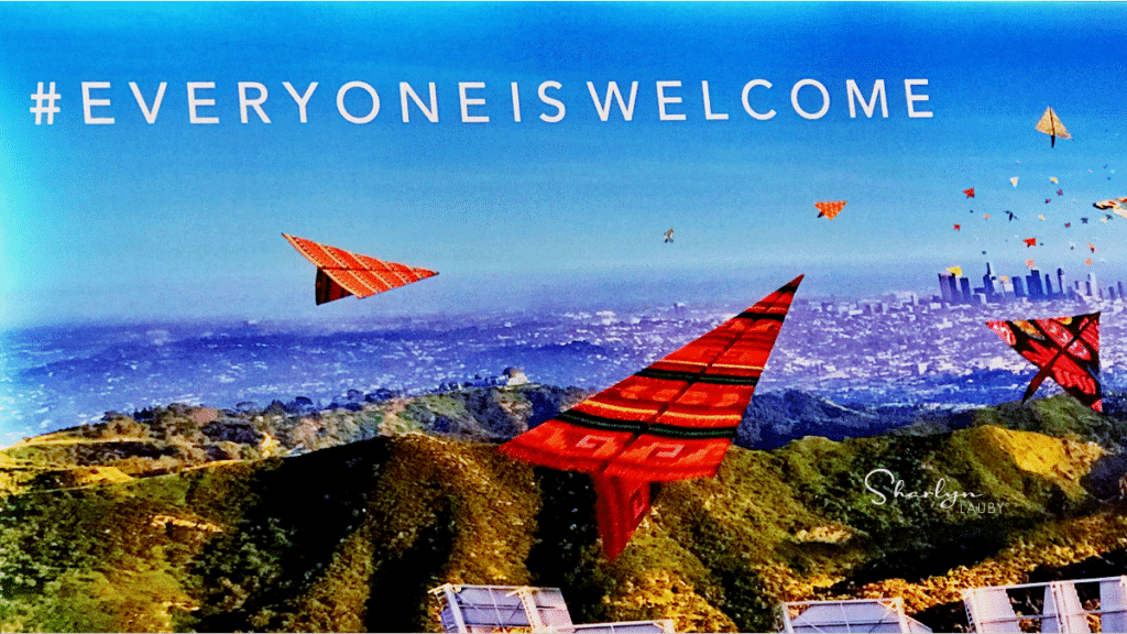 Airport sign everyone is welcome showing the importance of inclusion