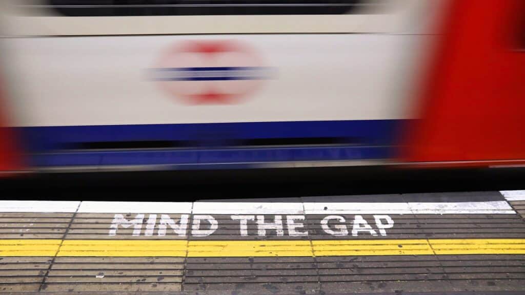 Mind the Gap for London train like the gap in remote work labor law postings