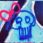 wall art graffiti showing skull with pink bow sick employee with COVID