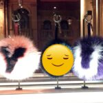 fuzzy key chains spelling you with serene emoji indicating good mental health