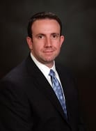 Cory Jorbin attorney HUB International headshot discussing family glitch affordable care act