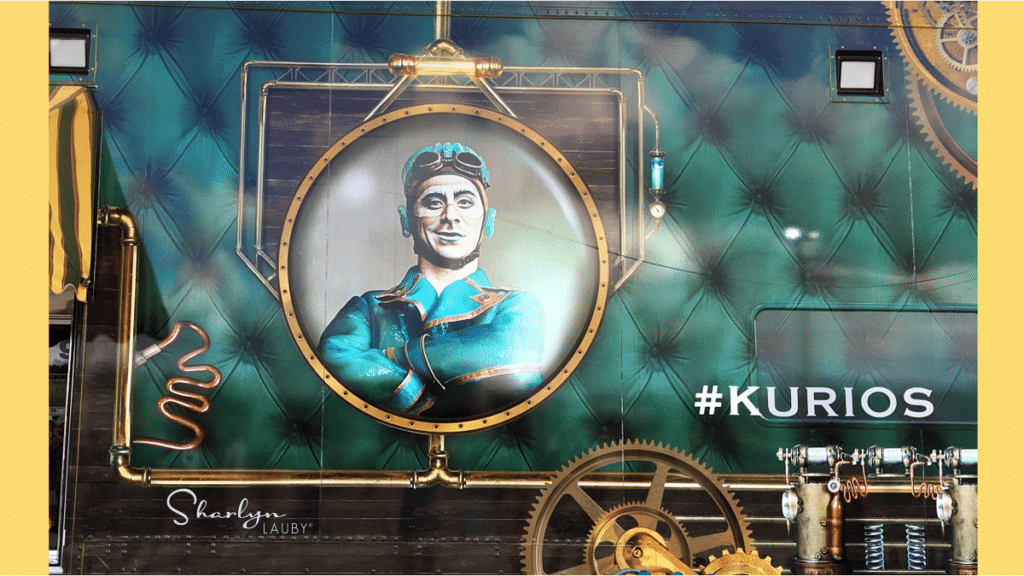 promotional banner for kurios or curious by Cirque du Soleil in Miami