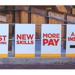 recruiting sign improved employee pay and in compliance