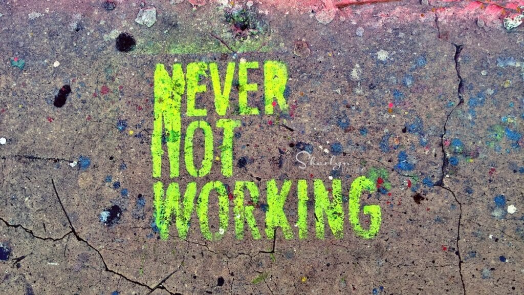 street art painted on sidewalk never not working like Human Resources HR
