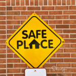 wall sign safe place to talk about pay at work