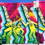 urban wall art stylized people organizational culture