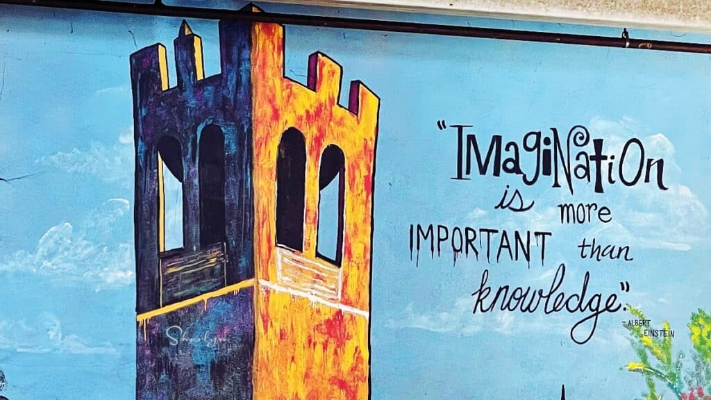 wall art of castle with Einstein quote on imagination similar to upskilling and reskilling