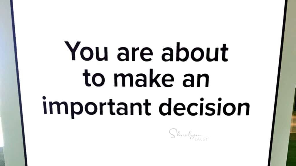 wall sign you are about to make an important decision in goal setting