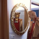 photograph artwork statue gazing into mirror implying self learning like artificial intelligence