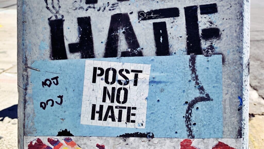 wall art post no hate indicating a toxic work environment