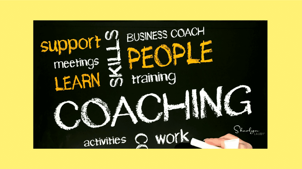 wall sign coaching people at work for a coaching culture