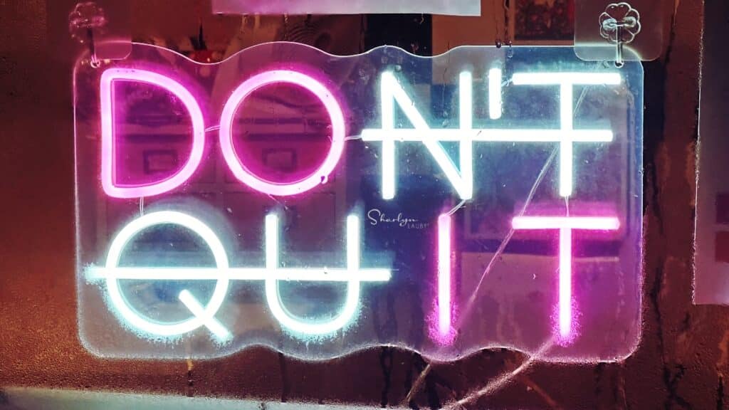 wall neon sign don't quit referring to recruiting strategy meetings
