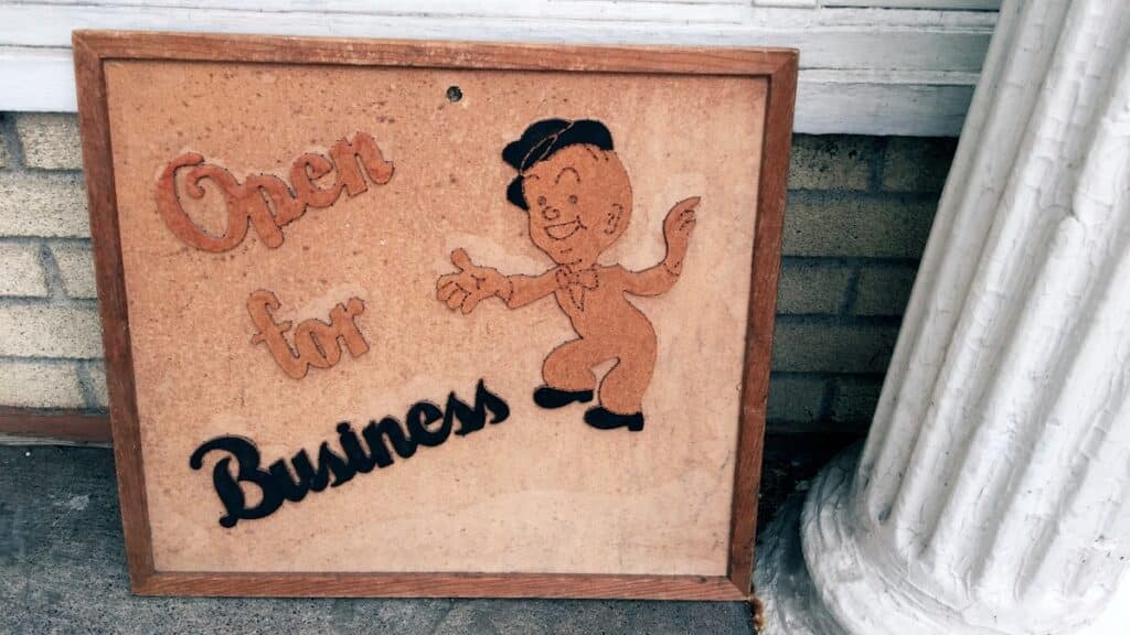 wall sign open for business thanks to good problem solving