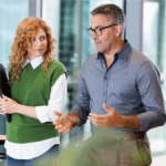 office meeting UKG discussing artificial intelligence talent strategies